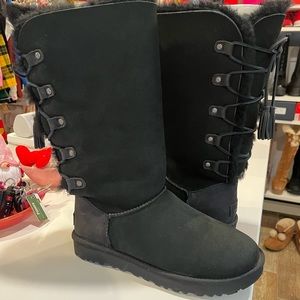 Authentic women’s size 9 UGG Kristabelle tall boots with tassel lace up.